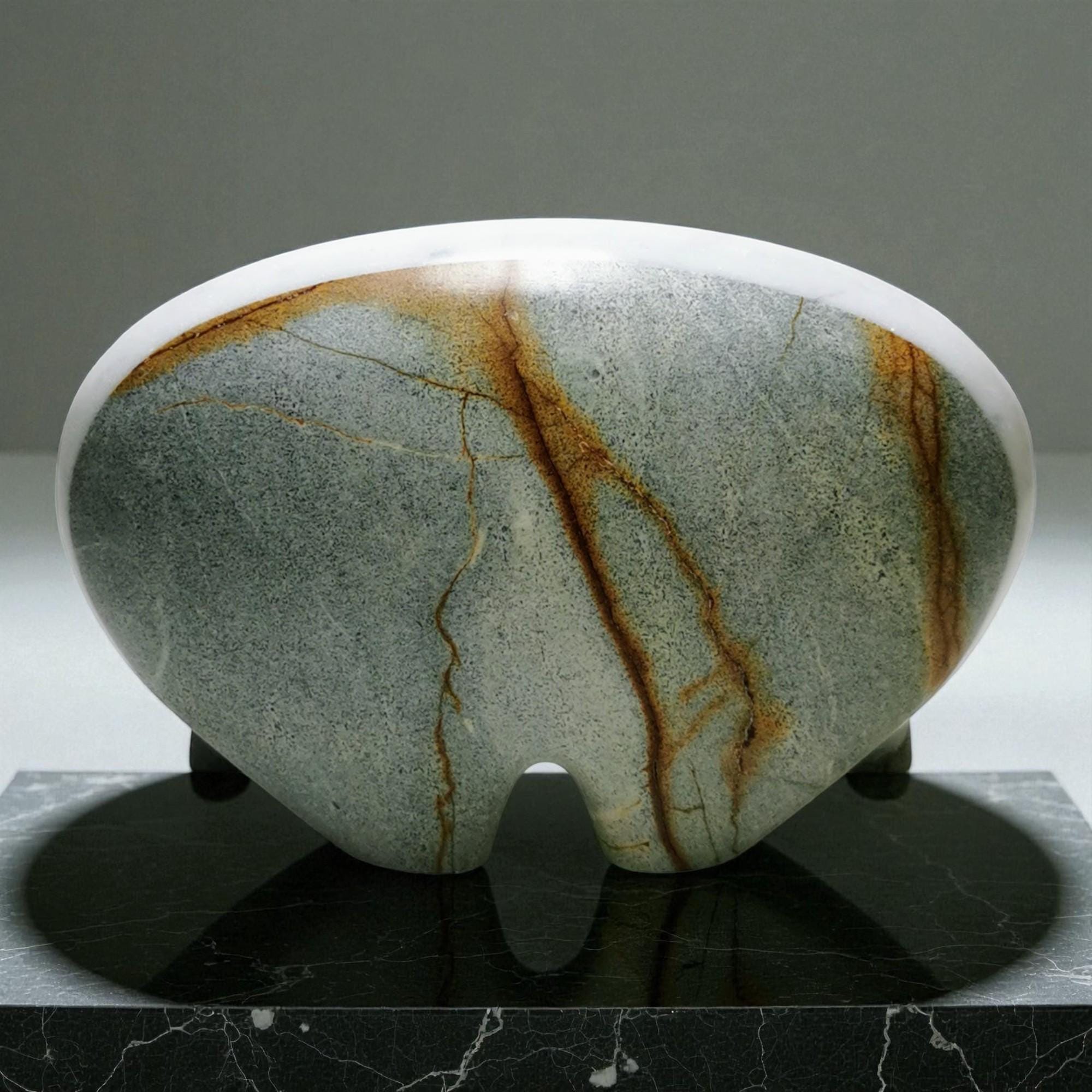 Marble-patterned stone on a stand with a gray background