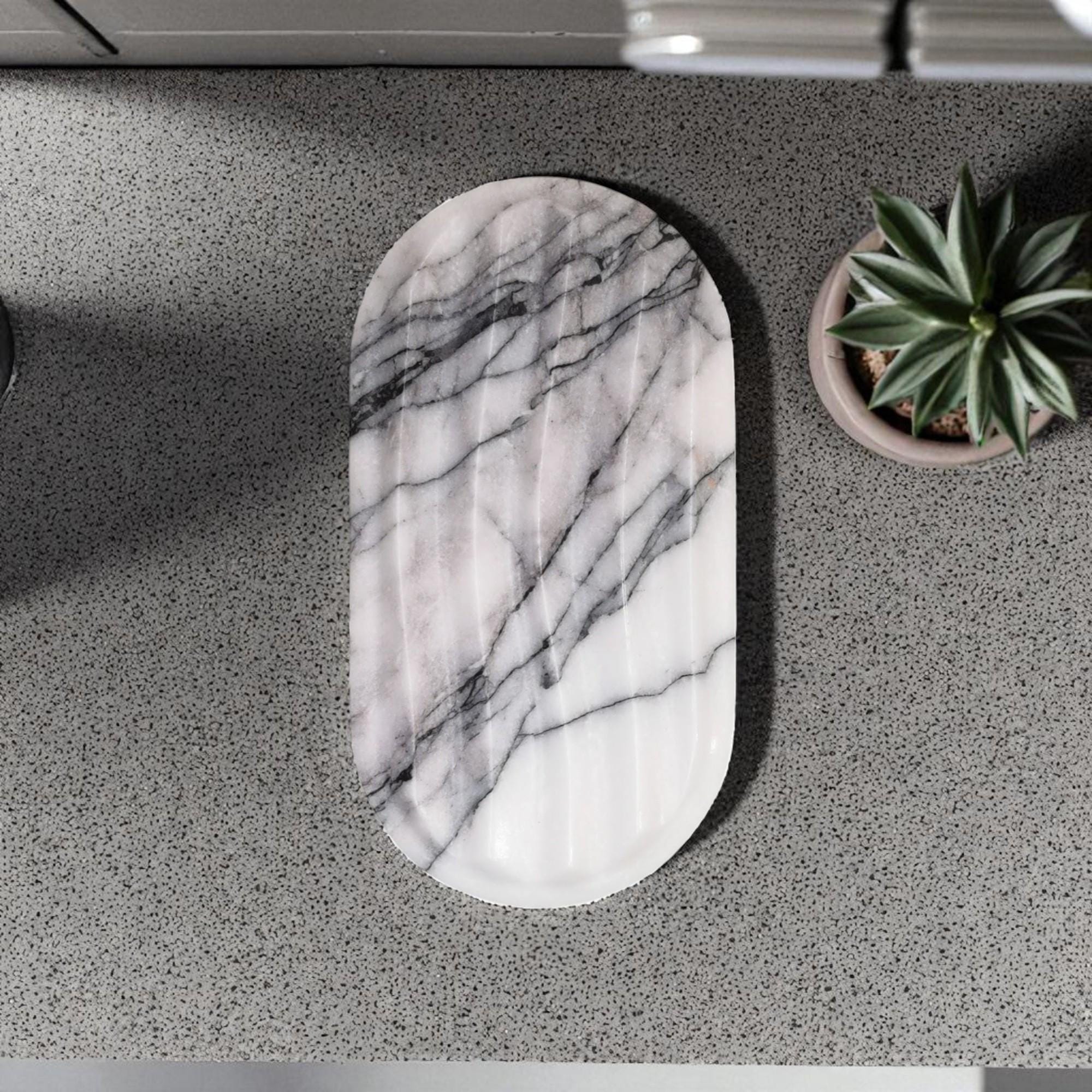 Handcrafted white marble soap dish with sculptural drain design, polished natural stone,
luxury bathroom accessory, artisan home decor piece
