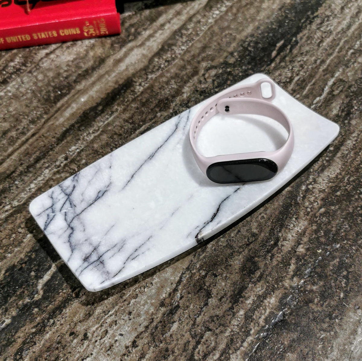 White marble jewelry tray, oval shape, natural grey veining