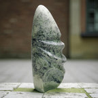 Hand-carved moss agate flame tower crystal sculpture with pointed top, green and white
natural stone, luxury mineral home decor, artisan-crafted
