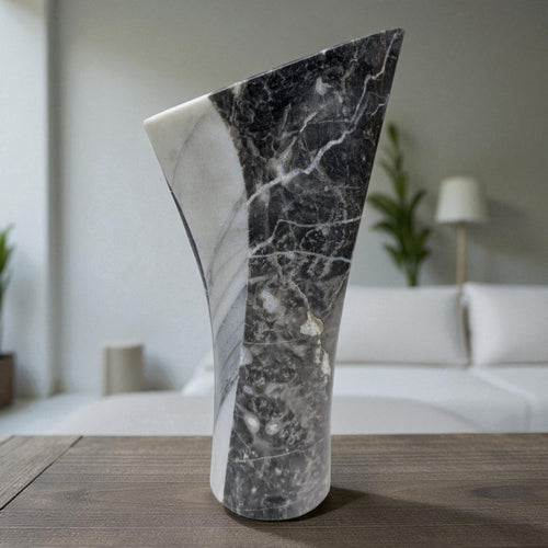 Natural marble sculpture with abstract flame form