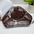 Geometric marble ashtray with angular form, polished stone, contemporary luxury decor
