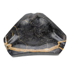 Geometric black and gold marble ashtray, white background