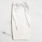 Top view of rectangular jewelry tray on a light gray background