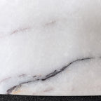 Close-up of a marble surface with gray and white veins
