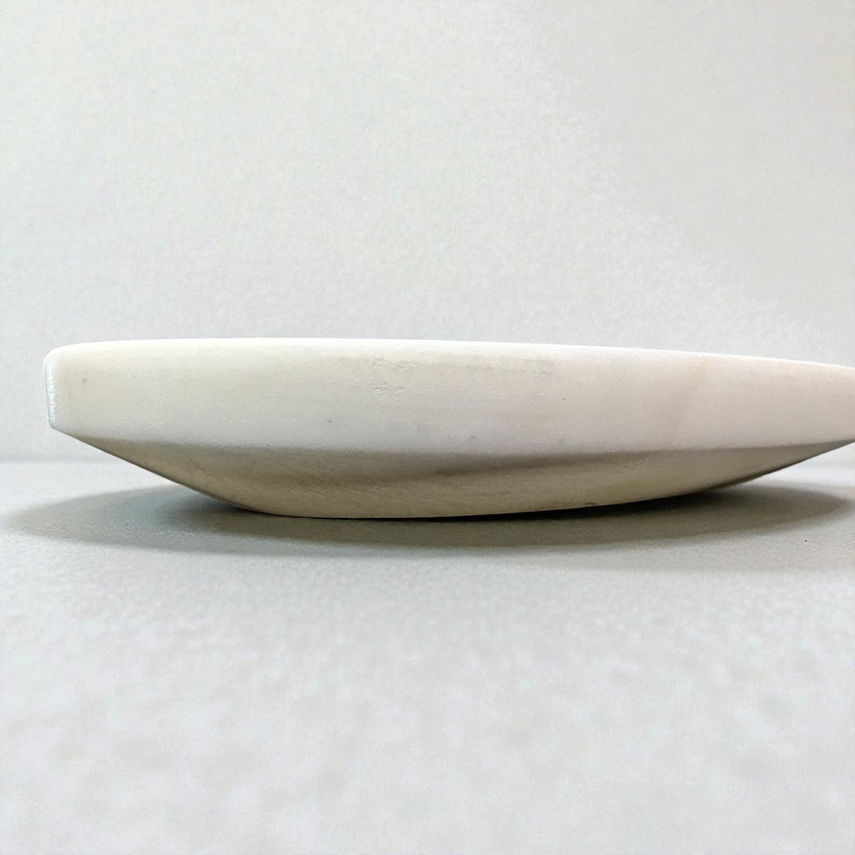 Rectangle marble jewelry tray, full view on a light grey background
