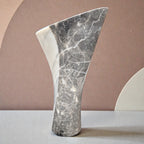 Marble sculpture on a neutral background