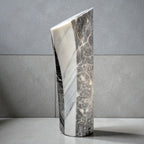 Marble-patterned vase on a gray background