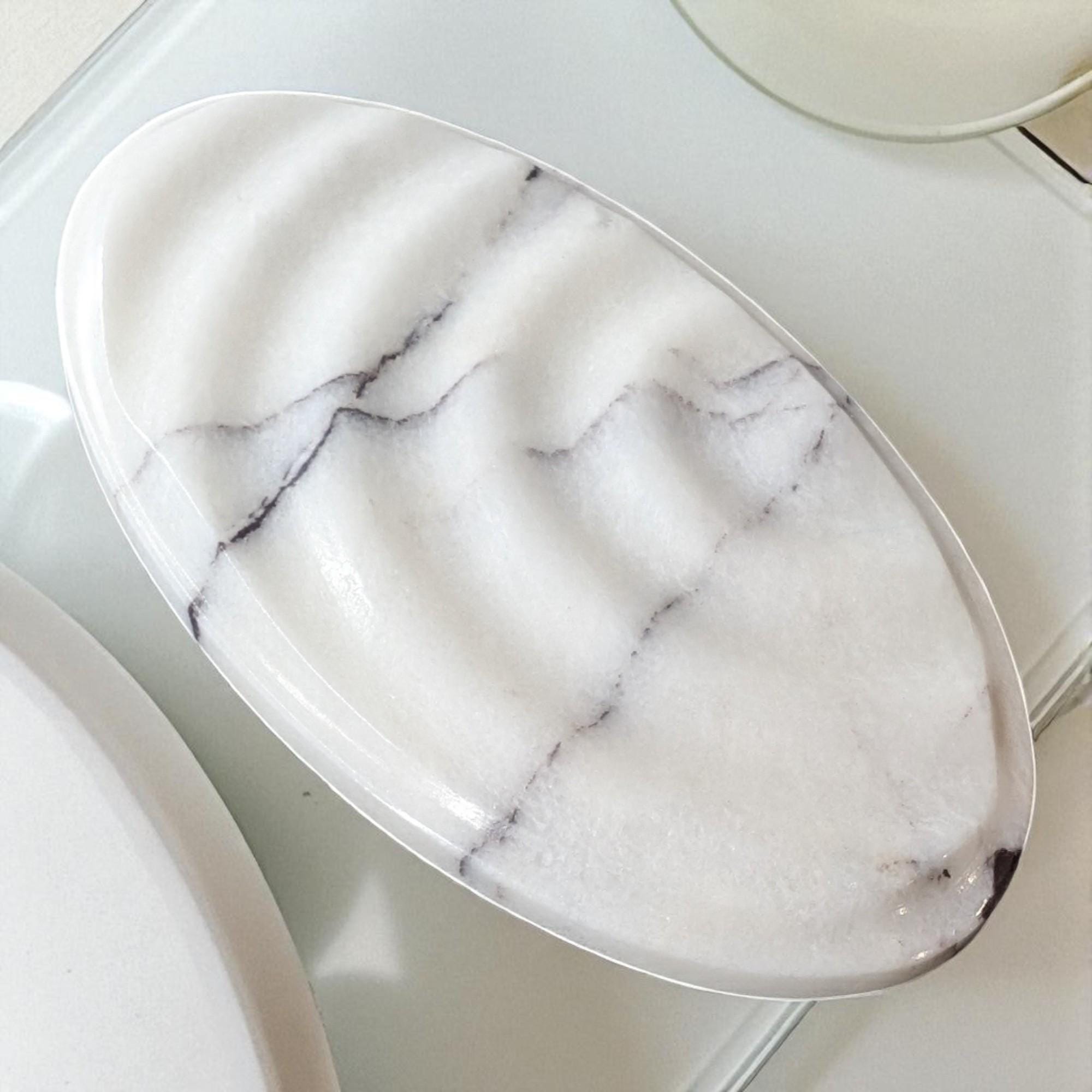 Marble-patterned stone dish on a light background